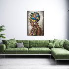 Stylish interior of bright living room with green sofa and plant